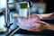 Detailed shot of a housewifes hands scrubbing dinner dishes with detergent