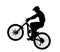 Detailed silhouette of mountain bike rider popping wheelie