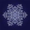 Detailed snowflake on dark blue background