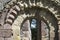 Detailed stone archways, Innisfallen Abbey on Innisfallen Island