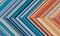 Detailed striped dual geometric pattern composed of big amount of thin orange and blue stripes