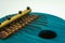 Detailed view of blue African kalimba on a white background. Traditional African music concept