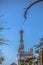 Detailed view of BuÃ§aco palace tower in the middle of trees