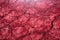 detailed view of crimson red marble with dark veins