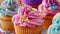 A detailed view of freshly baked cupcakes topped with colorful frosting, showcasing their delicious appeal