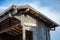 Detailed view of old train stop, small infrastructure, vintage wooden building