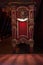 Detailed view of ornate wooden theater seat