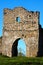 Detailed view of the ruins of main gate of the Krements castle. Beautiful spring evening. Blue sky in the background