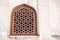 Detailed view of stone work in a window at Humayan`s Tomb in New Delhi India