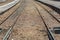 Detailed view of train line, rails in perspective, train station as background, in Regua city