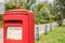 Detailed view of an unusual styled, tradition British Royal Mail post box.