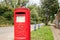 Detailed view of an unusual styled, tradition British Royal Mail post box.