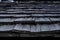 detailed view of a very old wooden roof of a forgotten mountain cottage