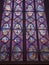 Details of beautiful glass mosaic windows of the Sainte Chapelle in paris