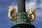 Details of the bronze lamp in Gustaf Adolf square, Gothenburg, Sweden