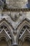 Details carved on one of the external walls of Westminster Abbey founded by Benedictine monks in