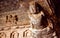 Details of ceiling design of 6th century Hindu temple in Badami, India. Artwork on stone surface in Indian structure