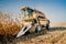 Details of combine harvester working in the fields. Agriculture Farmer working with machinery