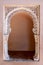Details of decorated Arab style famous Palace Alcazaba in Malaga Spain frame background