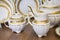Details of elegant white tableware. milk vessels