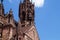 Details of of the facade of the Gothic cathedral Freiburg Minster, with the small belfry with Russian Orthodox cross