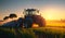 details of farmer working in the fields with tractor on a sunset background