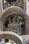 Details of figures at the base of the metal statue in homage to Santo Antonio, patron saint of the city of Lisbon.