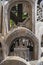 Details of figures at the base of the metal statue in homage to Santo Antonio, patron saint of the city of Lisbon.