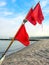 Details of a fishing boat: buoys with red flags at the beach of Ahrenshoop