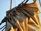 Details of gathered sail of a large sailing ship