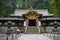 Details of a golden Toshogu complex in the town of Nikko, Japan, with both Shinto and Buddhist elements and wooden carvings