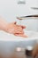 details of hand soap, disinfectant and antimicrobial soap in woman hands. Hand washing portrait photo