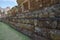 Details of laterite base of sandstone castle wall