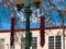 Details of the lights, decorative chile ristras, and historic building on the Plaza in Santa Fe, New Mexico, USA