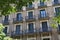 Details of the one of old residential buildings in the historical center of Barcelona in sunny day. Spain