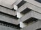 Details of railings and balconies on an old brutalist concrete building