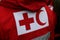 Details with the Red Cross and Red Crescent symbol on a uniform.