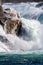 Details of Rhine Falls, the largest waterfalls in Europe, in winter frost,
