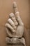 Details of Roman statues in the city of Rome Italy giant hand of the statue with raised index finger