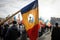 Details with the Romanian flag with a hole, the symbol of the Romanian Revolution from December 1989 when the communist emblem was