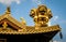 Details of roof golden Lions on Buddhist Jing An Tranquility Temple - Shanghai, China