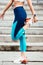 Details of stretching exercise. Portrait of athlete running