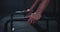 Details of a strong hand of a guy get ready to start his hard workout exercises in a cross fitness class