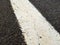 Details of white line on the road on the asphalt