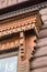 Details of wood carving of a window frame.