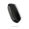 A detangler hairbrush float on white. A comb for detangling and caring for hair and scalp. Accessory for a lather shampoo and head