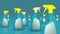 Detergent bottles makes spray on blue background