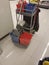 Detergent bucket mops on super market floor