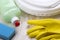 Detergent,sponge, dishes and latex gloves