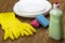 Detergent,sponge, dishes and latex gloves